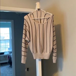 Grey sweater with black stripes. Very stretchy